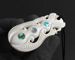 Hand-Carved Maori Bone Pendant with Three Pāua Shell Inlays (83mm x 40mm)