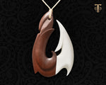 Hand-carved Hawaiian Makau wood fish hook necklace with a bone barb insert from Tuwharetoa Bone