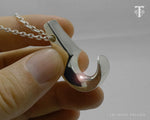 Handcrafted silver Hawaiian Lei Niho Palaoa necklace, featuring a traditional Polynesian hook pendant