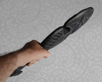 intricate paua shell inlay on Maori Patu
