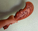 42cm long Maori Patu held to show substantial size and craftsmanship for leadership gifts.