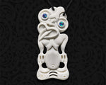 Hand-carved medium Maori bone Hei Tiki pendant from Tuwharetoa Bone, New Zealand