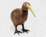 A "facing camera" view of the New Zealand Kiwi figurine, showcasing its sturdy legs and symmetrical casting.