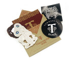 Maori bone Tiki pendant necklace presented in envelope, ready for gifting.