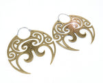 Pair of large brass circular earrings with traditional Maori Moko Kauae patterns from Tuwharetoa Bone