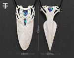 Close-up of hand-carved bone Taiaha pendant with Paua shell inlay - Maori necklace