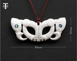 Hand-carved bat pendant resilience