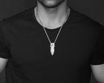 Silver Taiaha Pendant Worn as a Necklace, Representing Maori Culture