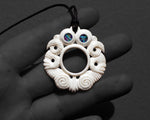 Maori bone Tiki pendant carving