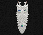 Hand-carved Maori bone pendant representing Tane, the god of forests and creation, with paua shell inlay