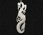 Front view of a hand-carved Maori manaia bone pendant