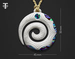Close-up of Maori Koru Bone Pendant Engravings and Paua Shell Detailing