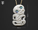 Front view of hand-carved Maori bone Tiki pendant necklace showing measurements 