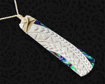 hand-carved Maori bone Hei Toki necklace