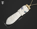Detailed carving of the King Taiaha Maori warrior pendant showing the Upoko (head) and Arero (tongue)