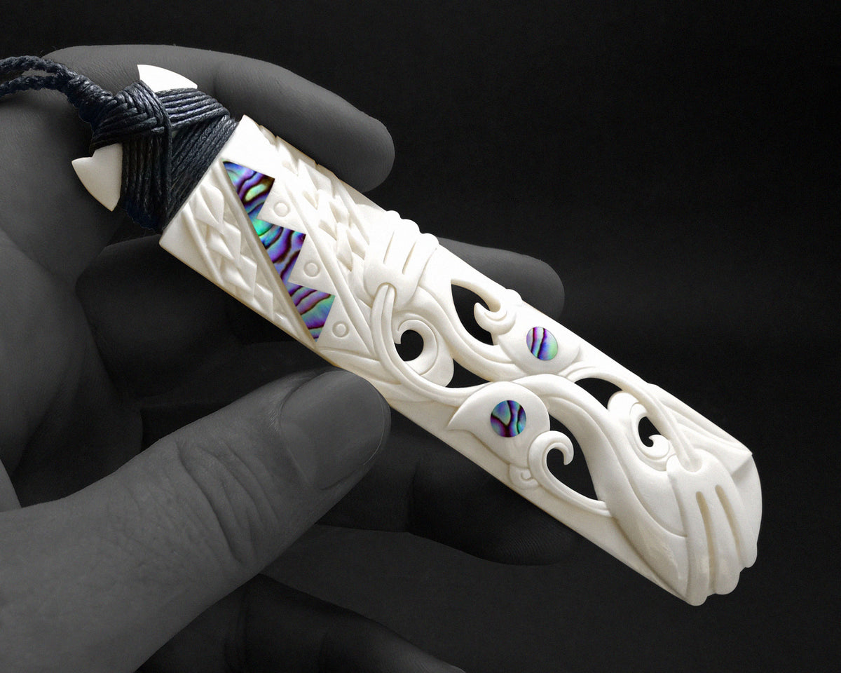 Medium Hand Carved Maori Bone Hei Toki with Paua Shell Inlay – Toa Bone