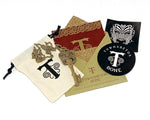 Maori 21st Key Pendant featuring a traditional Koruru carving and 'NZ' detail, with envelope and stickers