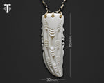 Maori Rei Puta necklace with a traditional Maori inspired design, showing measurements 