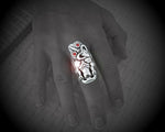 Close-up of Silver Maori Tiki Ring Design